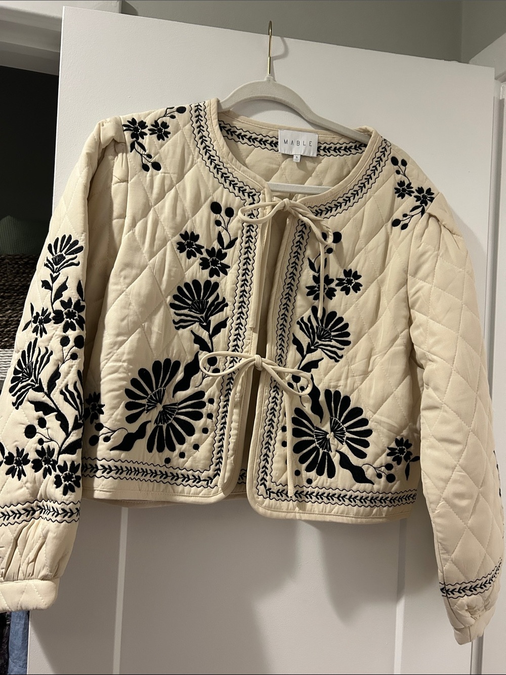 MARBLE Cream Quilted Bomber Jacket with Black Floral Embroidery